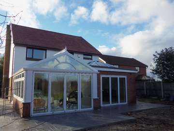 Greasby Wirral : Installation of Centor C1 Triple glazed Bi Fold doors U Value .75. - K2 PvcU Capped rooflight glazed with easy clean Celsius one sealed units U value 1. Conservatory : 2800 ststem White PvcU windows and doors TRIPLE Glazed U value .85 with K2 roof system glazed with Celsius One